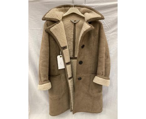 A LAMBSKIN BUTTON THROUGH COAT 