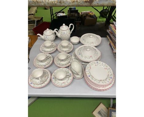 A NEAR COMPLETE JOHNSON BROS DINNER SERVICE INCLUDING DINNER AND SIDE PLATES, CUPS AND SAUCERS, TEA AND COFFEE POT, TUREENS, 