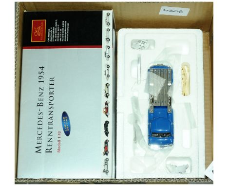 CMC M-036K Mercedes-Benz 1954 Renntransporter - 1/43 Scale with blue body, wheels with plated hubs with flatbed. This comes c