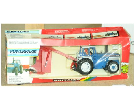 Britains - a boxed Farm related Model (Power Farm Motorised Series) 9383 Ford Tractor and Grass Mower which generally appears