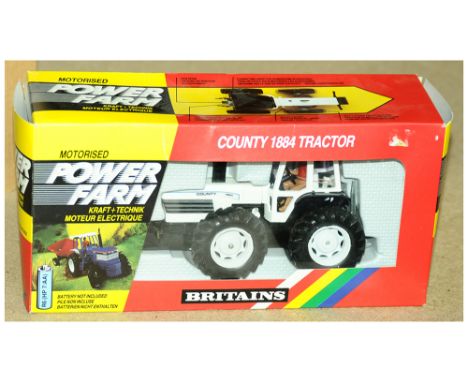 Britains (Motorised Power Farm Series) - a boxed 9324 County 1884 Tractor. Model generally appears to be Good although not ch