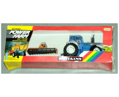 Britains (Motorised Power Farm Series) - a boxed 9384 Ford and Power Harrow Tractor with Cultivation Unit. Model generally ap