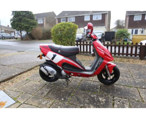 Rare, limited-edition 'pit bike' signed by Carl Fogarty with very low-mileage and in very good condition.A limited-production