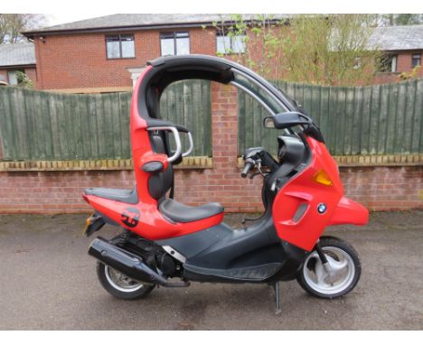 Designed by Bertone for BMW as a 'civilised scooter' with a roof and windshield. Offered at No Reserve.Marketed by BMW as a '