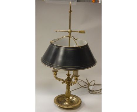 A 20th Century gilt brass three light table lamp with arrow and scrolling acanthus decoration in the Regency taste