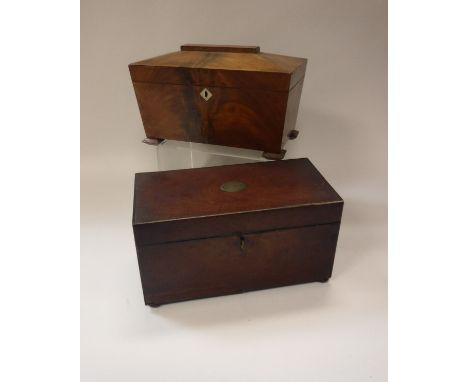 A 19th Century mahogany tea caddy, the top bearing plaque inscribed "MA &amp; J Coy" opening to reveal a fitted interior with