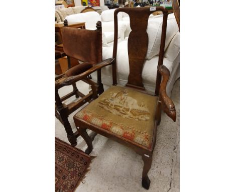 A 19th Century elbow chair with vase shaped splat back and eagle head finials to tapestry seat