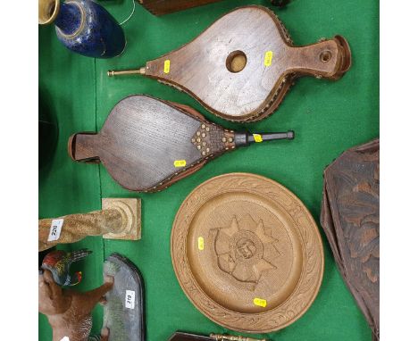 A pair of brass studded leather bound bellows with brass nozzle stamped JW to underside, together with a carved treen ware bo