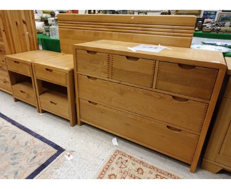 An Ercol "Bosco" bedroom suite comprising chest of three short over two long drawers, a pair of bedside tables and a headboar