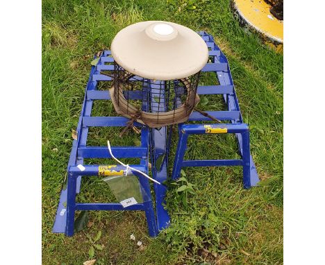 A collection of tools to include a Power Devil angle grinder, circular saw, various loppers, pair of car ramps, etc