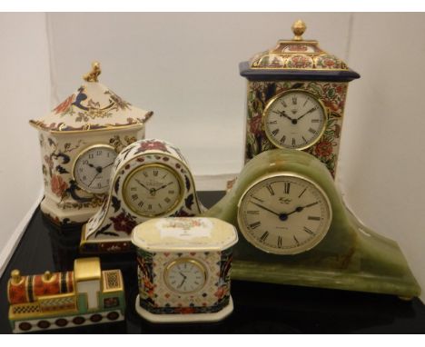 A Mason's ironstone Imperial clock (663/1996), a Mason's ironstone "Mandalay" clock, a Royal Worcester "Prince Regent" clock,