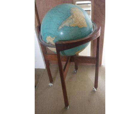 A vintage Rand McNally indexed terrestrial globe, housed on a mahogany stand