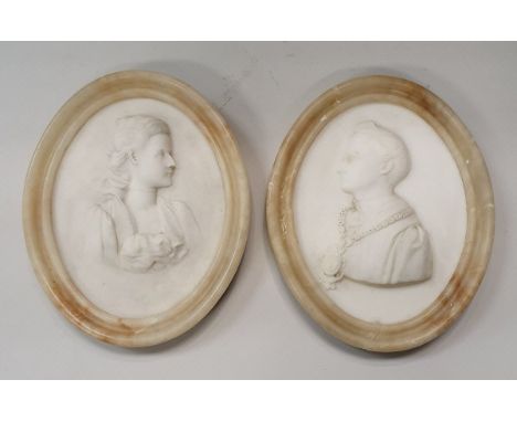 A pair of circa 1900 alabaster portrait studies of a lady and gentleman