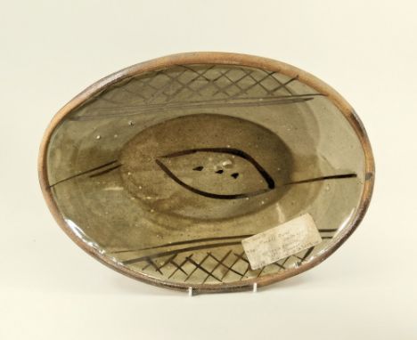 MICHAEL CARDEW. A Wenford Bridge press-moulded baking dish. Painted MC monogram. 37 x 327cm. Reference label to reverse.