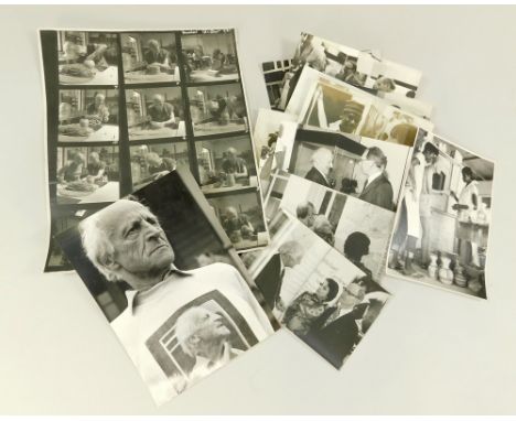 PHOTOGRAPHS: MICHAEL CARDEW.A sheet of contact prints of Michael Cardew demonstrating in the USA in 1967, various photographs