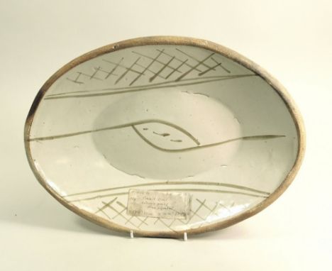 MICHAEL CARDEW. A Wenford Bridge press-moulded baking dish. Painted MC monogram. 37 x 37cm.