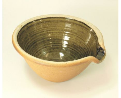 MUCHELNEY POTTERY. A John Leach Muchelney Pottery pouring bowl. Pottery mark. Diameter 23cm, height 12cm.