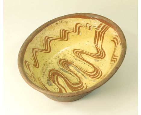 MICHAEL CARDEW?. A North Devon type baking dish, possibly Winchcombe Pottery by Michael Cardew. Unmarked. Remains of York Art