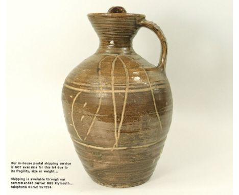 MICHAEL CARDEW. A large Wenford Bridge flagon with screw thread stopper. Personal &amp; Pottery marks. Height 36cm. Chip to r