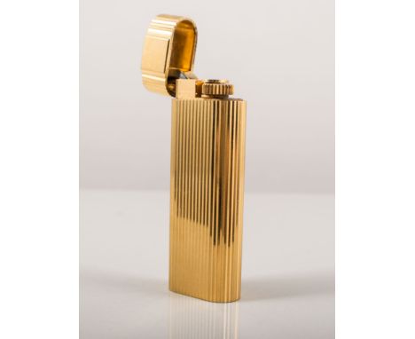 Cartier gilt metal briquet lighter, No. 17459T, 7cms, boxed and with with papers.