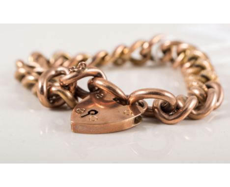A 9ct gold hollow curb link chain, padlock clasp.
