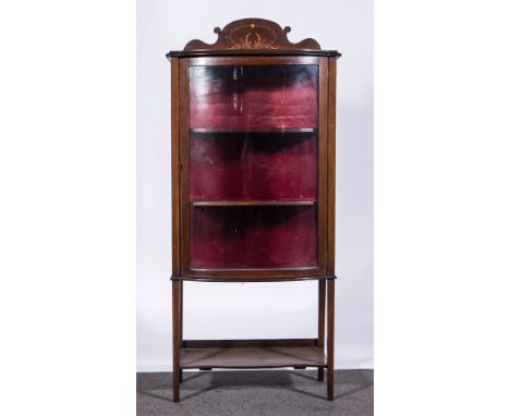 Edwardian mahogany bow front china cabinet, inlaid decoration, glazed door enclosing two shelves, serpentine shelf under, wid