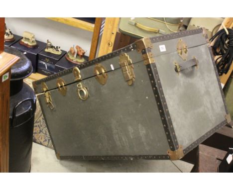 Large grey travelling trunk