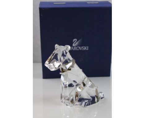 Swarovski crystal Symbols Classics figure in the form of an Airedale Terrier dog, with white metal collar set with blue cryst