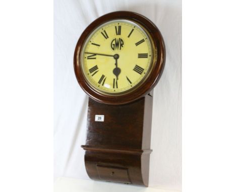 Oak cased GWR Station clock, key wind with Fusee movement and marked GWR to the enamel dial, with GWR 3129 plaque to the side