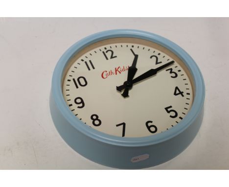 Cath Kidston Circular Wall Clock together with a Pale Blue Painted Hanging Wall Cabinet with Glazed Door