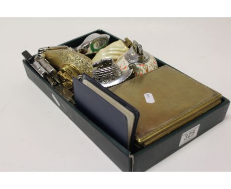 Table lighters to include Ronson, one in the form of a swan, clasped hands etc, boxed ladies Ronson lighter with mother-of-pe