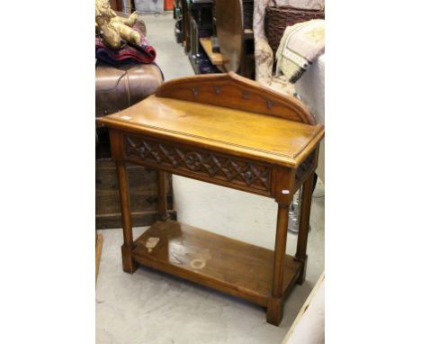 Oak Gothic Style Hall Table with Carved Arched Back and Single Drawer above a Shelf below