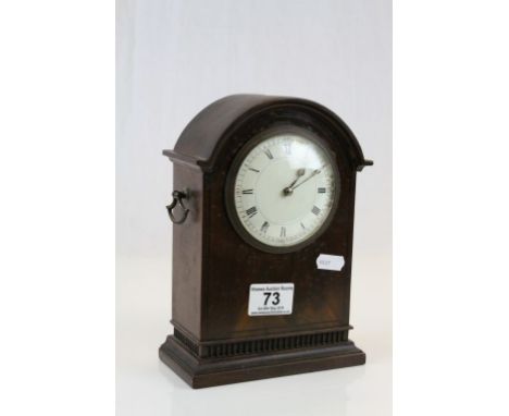 Mahogany key wind Mantle clock with enamel dial, the movement marked with a lion symbol