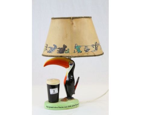 Carlton Ware Guinness ceramic Table lamp with Toucan and motto "How Grand to be a Toucan. Just Think what Toucan do", marked 