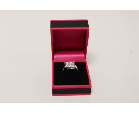 A 14CT White Gold pave set sapphire and diamond ring 1CT approx.
