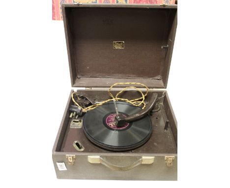 Vintage Trixette Portable Record Player together with Canvas and Leather Suitcase