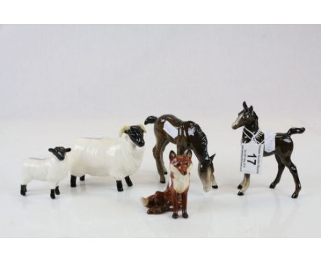 Small group of Beswick ceramic animals to include; two Foals, two Sheep and a seated Fox