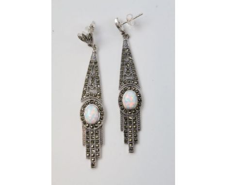 A pair of silver and marcasite art deco style earrings with opal panel.