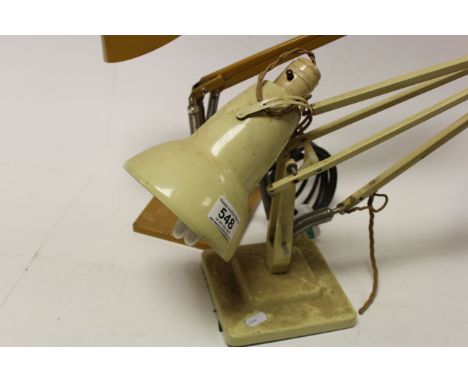 Herbert Terry Angle Poise Lamp together with a Planet Studios Angle Poise Lamp