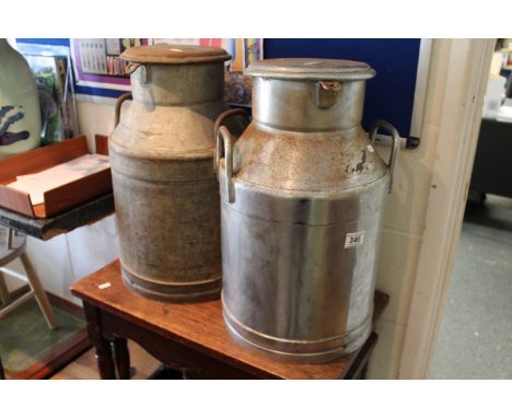 Pair of vintage Milk Churns, one with a chrome finish