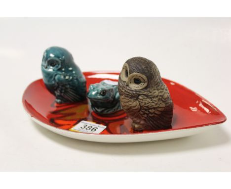 Three Poole Pottery animals and a Poole Delphis dish