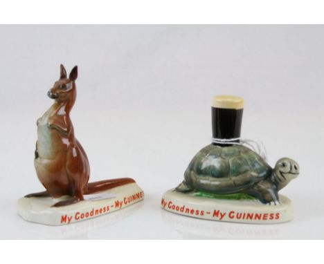 Two vintage Carlton Ware ceramic Guinness models, a Kangaroo with bottle of Guinness GA 2197 D, and a Tortoise with pint of G