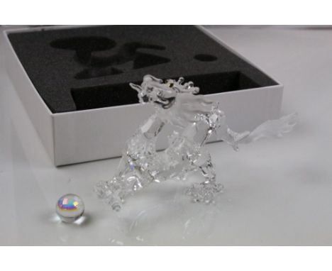 Swarovski Crystal figure of a five toed Chinese dragon, colourless and frosted glass with yellow glass eyes together with irr