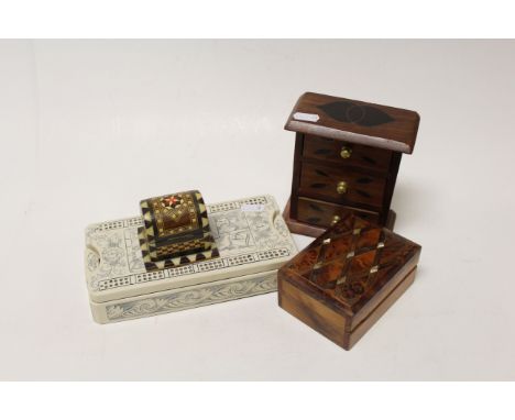 Scrimshaw style games compendium and Three small wooden trinket boxes and three draw mini cabinet.