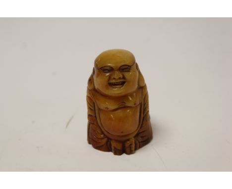 Bone netsuke of a Happy Buddha