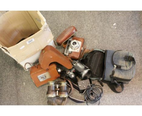 Small collection of vintage cameras to include Yashica, a Cine camera and a cased pair of Binoculars