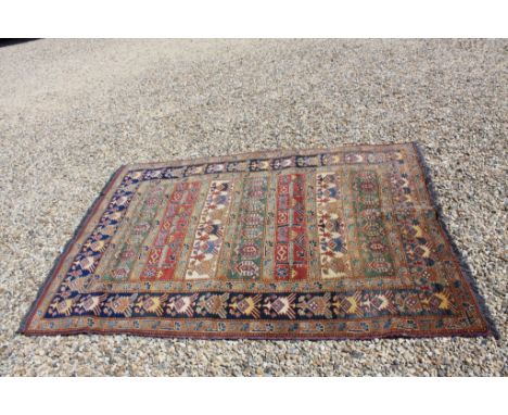 Vintage rug with lead weight tag
