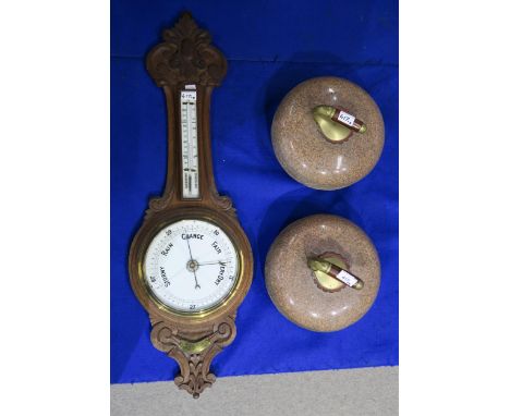 A pair of Ailsa Craig granite curling stones, together with an early-C20th barometer/thermometer&nbsp; Condition Report:Avail