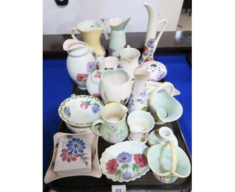 A collection of E Radford hand painted pottery mainly decorated with anemones Condition Report:No condition report available.