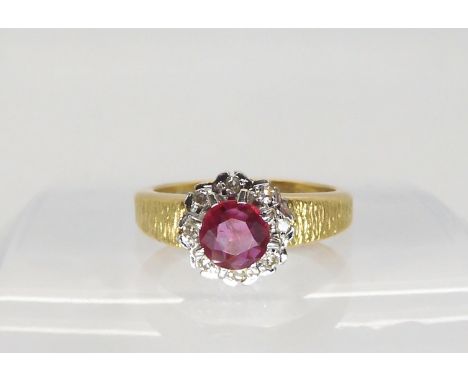 An 18ct gold synthetic ruby and diamond retro ring, size M1/2, weight 5gms Condition Report:Available upon request